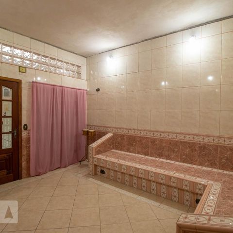 Casa à venda com 345m², 4 quartos e 1 vagaSala de TV