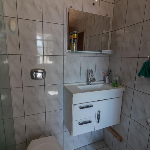 Casa à venda com 250m², 4 quartos e 2 vagasBanheiro