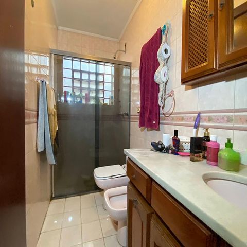 Casa à venda com 400m², 4 quartos e 2 vagasBanheiro 3