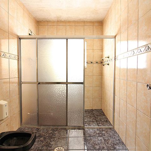 Casa à venda com 125m², 4 quartos e 4 vagasBanheiro Social 1