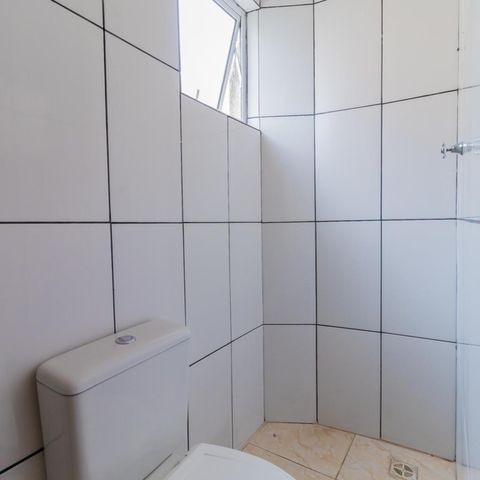 Casa de condomínio à venda com 66m², 2 quartos e 1 vagaBanheiro da Suíte 1