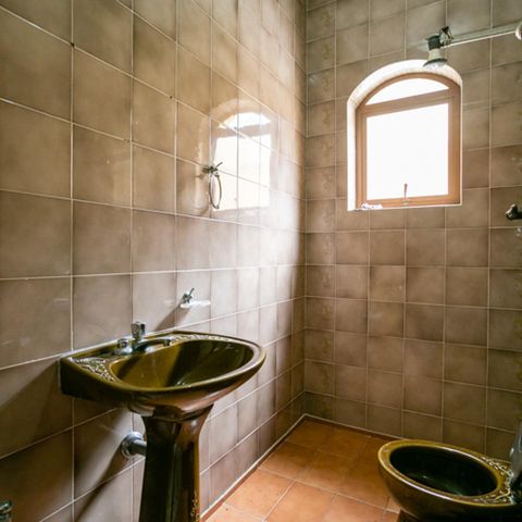 Casa à venda com 400m², 4 quartos e 8 vagasLavabo da Churrasqueira