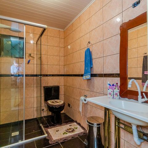 Casa à venda com 202m², 3 quartos e 3 vagasBanheiro 2