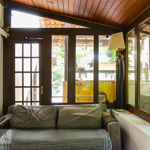 Casa de condomínio à venda com 366m², 5 quartos e 4 vagasSala de TV