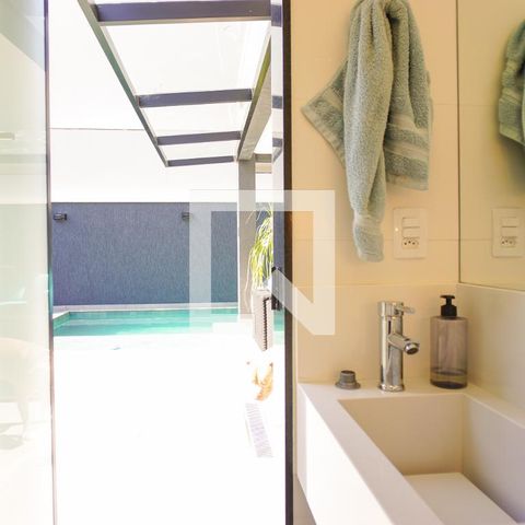 Casa de condomínio à venda com 400m², 4 quartos e 4 vagasLavabo