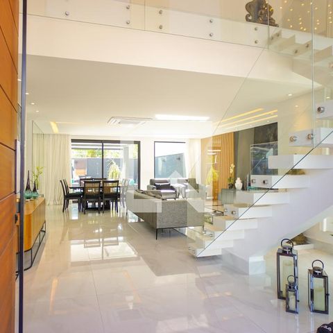 Casa de condomínio à venda com 400m², 4 quartos e 4 vagasSala