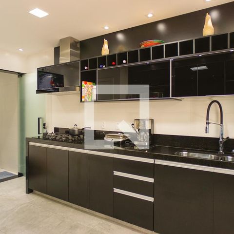Casa de condomínio à venda com 400m², 4 quartos e 4 vagasCozinha e Área de Serviço