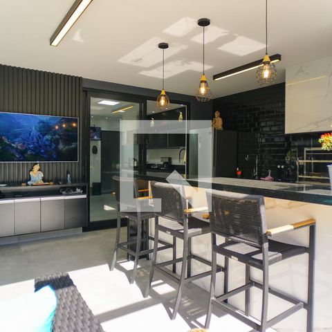 Casa de condomínio à venda com 400m², 4 quartos e 4 vagasVaranda Gourmet