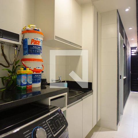 Casa de condomínio à venda com 400m², 4 quartos e 4 vagasCozinha e Área de Serviço