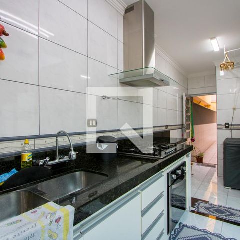 Casa à venda com 153m², 2 quartos e 2 vagas Casa à venda com 153m², 2 quartos e 2 vagasCozinha