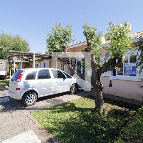 Casa de condomínio à venda com 80m², 3 quartos e 2 vagas Casa de condomínio à venda com 80m², 3 quartos e 2 vagasFachada