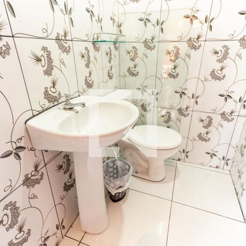 Casa à venda com 70m², 2 quartos e 1 vaga Casa à venda com 70m², 2 quartos e 1 vagaQuiosque da churrasqueira - lavabo
