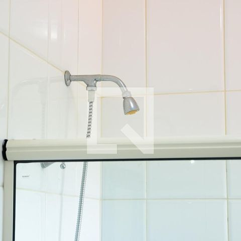Casa de condomínio para alugar com 315m², 3 quartos e 6 vagasBanheiro da Suíte 1