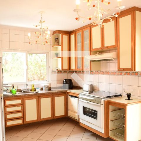 Casa de condomínio para alugar com 315m², 3 quartos e 6 vagasCozinha