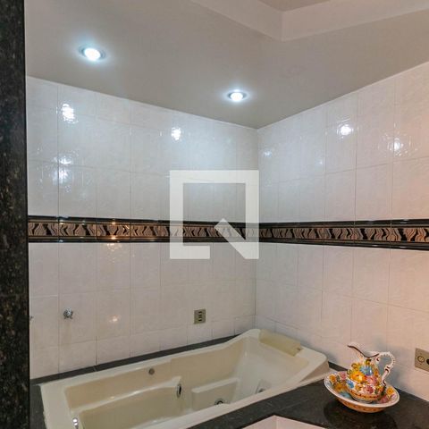 Casa à venda com 405m², 5 quartos e 2 vagasBanheiro da Suíte
