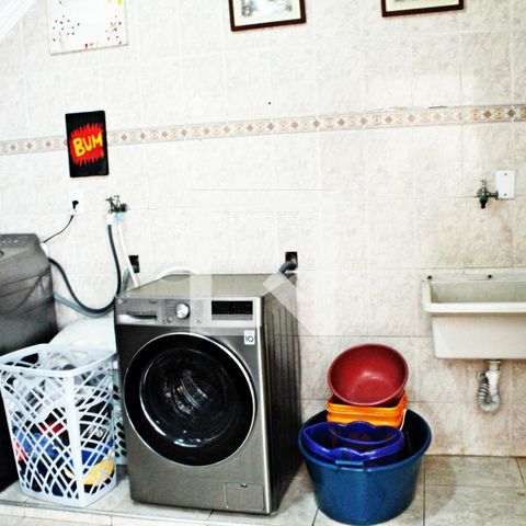 Casa à venda com 320m², 4 quartos e 4 vagasLavanderia