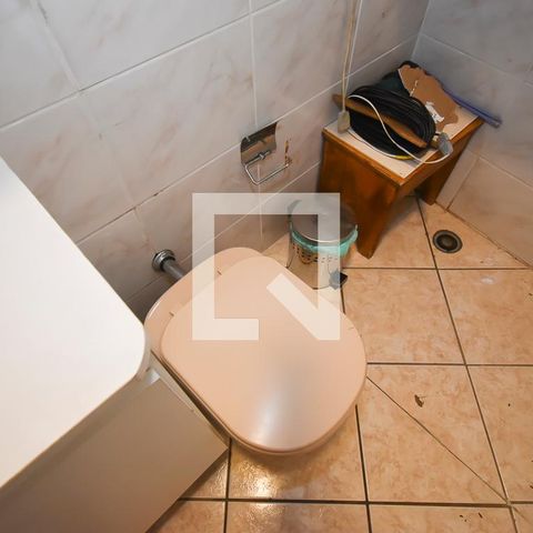 Casa à venda com 440m², 7 quartos e 6 vagas Casa à venda com 440m², 7 quartos e 6 vagasBanheiro da Garagem