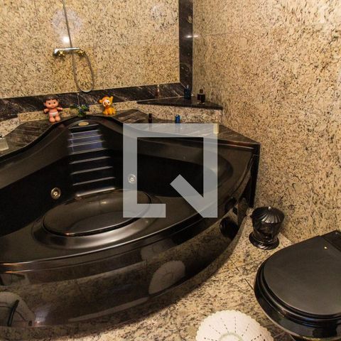 Casa à venda com 500m², 4 quartos e 3 vagasBanheiro da Suíte 1