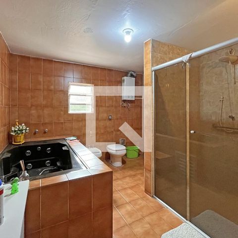 Casa à venda com 330m², 3 quartos e 2 vagasBanheiro da Suíte