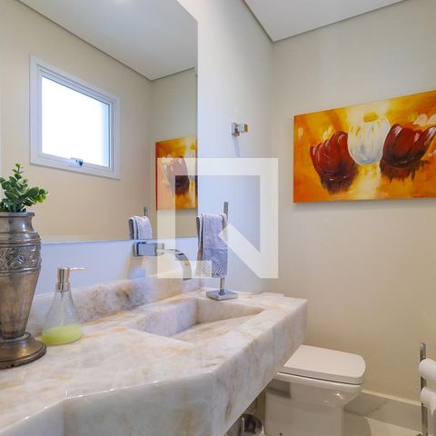 Casa de condomínio à venda com 200m², 3 quartos e 4 vagasLavabo