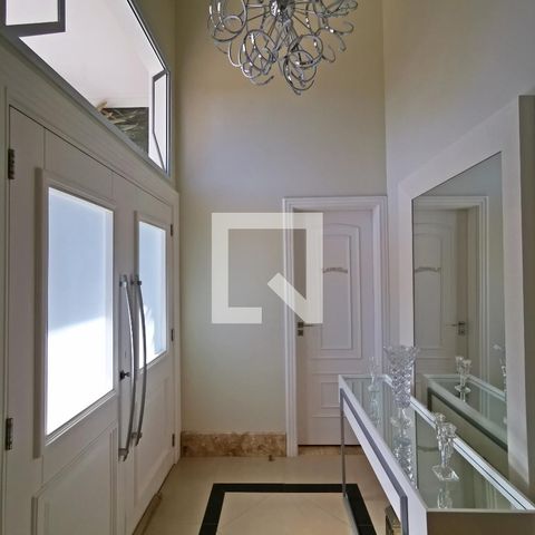 Casa de condomínio à venda com 585m², 5 quartos e 6 vagas Casa de condomínio à venda com 585m², 5 quartos e 6 vagasDetalhe Sala
