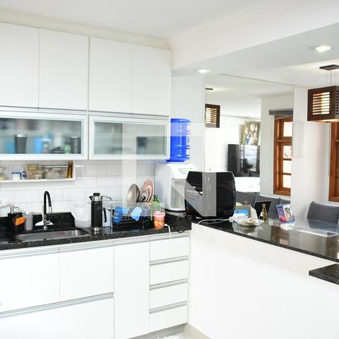 Casa de condomínio para alugar com 90m², 3 quartos e 2 vagasCozinha