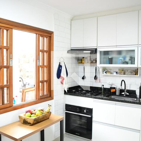 Casa de condomínio para alugar com 90m², 3 quartos e 2 vagasCozinha