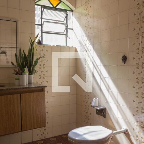 Casa à venda com 214m², 3 quartos e 2 vagasBanheiro