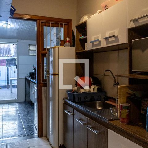 Casa à venda com 40m², 2 quartos e 1 vaga Casa à venda com 40m², 2 quartos e 1 vagaCozinha