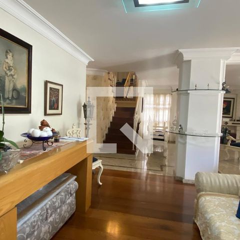 Casa de condomínio à venda com 320m², 4 quartos e 4 vagasSala