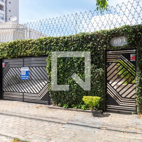 Casa à venda com 385m², 5 quartos e 6 vagas Casa à venda com 385m², 5 quartos e 6 vagasFachada com a Plaquinha Instalada