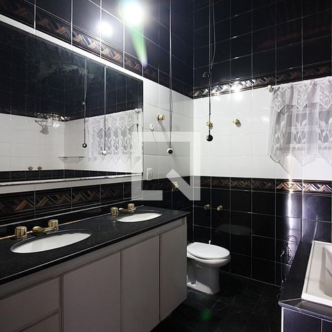 Casa à venda com 344m², 4 quartos e 6 vagasQuarto 1 - Suíte Banheiro 