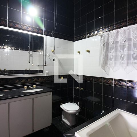 Casa à venda com 344m², 4 quartos e 6 vagasQuarto 1 - Suíte Banheiro 