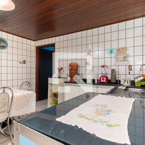 Casa à venda com 70m², 2 quartos e 2 vagas Casa à venda com 70m², 2 quartos e 2 vagasCozinha