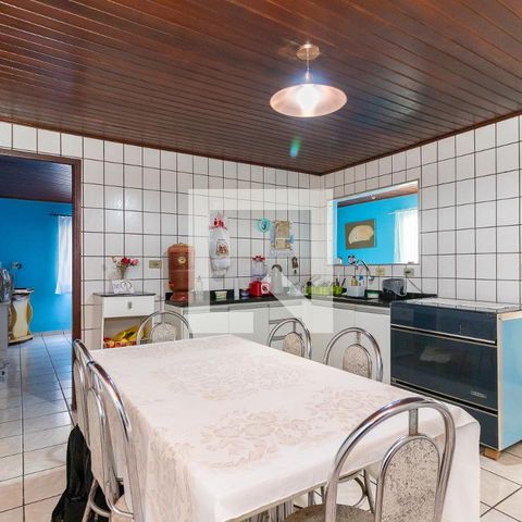 Casa à venda com 70m², 2 quartos e 2 vagas Casa à venda com 70m², 2 quartos e 2 vagasCozinha
