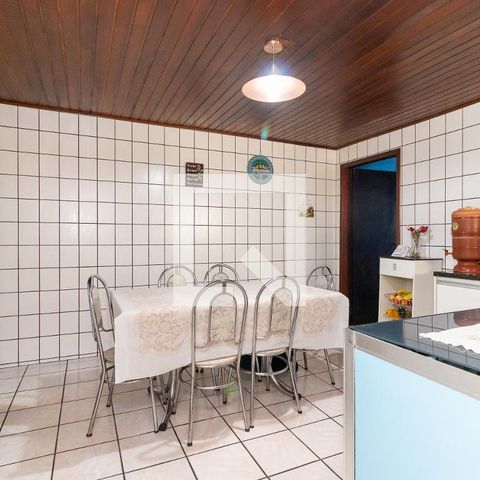 Casa à venda com 70m², 2 quartos e 2 vagas Casa à venda com 70m², 2 quartos e 2 vagasCozinha