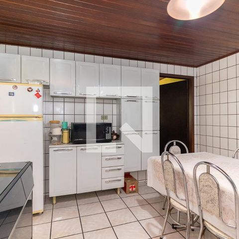 Casa à venda com 70m², 2 quartos e 2 vagas Casa à venda com 70m², 2 quartos e 2 vagasCozinha