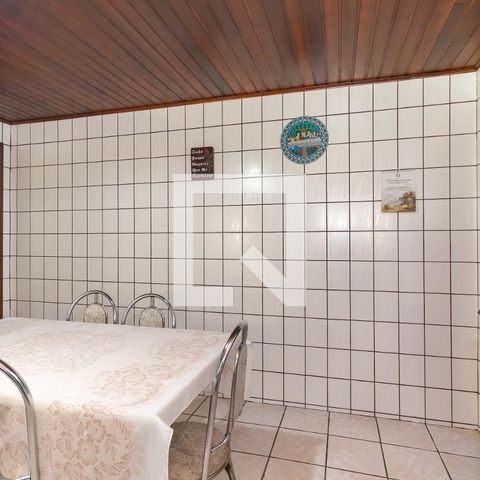 Casa à venda com 70m², 2 quartos e 2 vagas Casa à venda com 70m², 2 quartos e 2 vagasCozinha