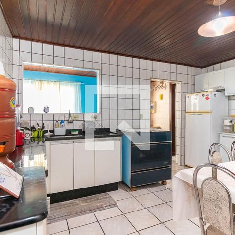 Casa à venda com 70m², 2 quartos e 2 vagas Casa à venda com 70m², 2 quartos e 2 vagasCozinha