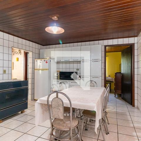 Casa à venda com 70m², 2 quartos e 2 vagas Casa à venda com 70m², 2 quartos e 2 vagasCozinha