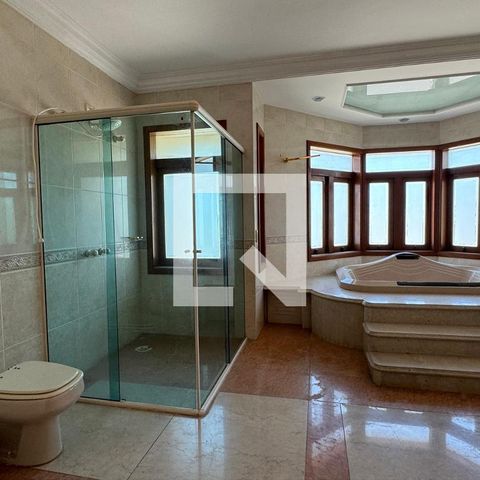 Casa de condomínio à venda com 975m², 4 quartos e 8 vagasBanheiro da Suíte 2