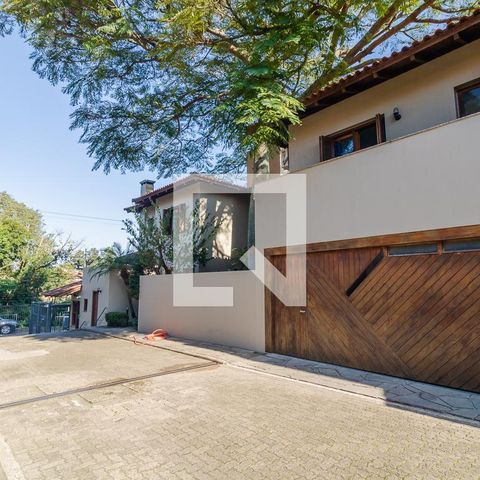 Casa de condomínio para alugar com 450m², 4 quartos e 3 vagas Casa de condomínio para alugar com 450m², 4 quartos e 3 vagasFachada da casa
