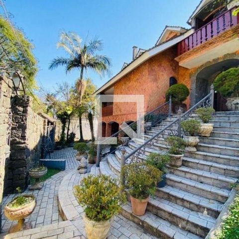 Casa de condomínio à venda com 600m², 6 quartos e 9 vagas