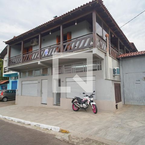 Casa à venda com 630m², 3 quartos e 2 vagas Casa à venda com 630m², 3 quartos e 2 vagasFachada