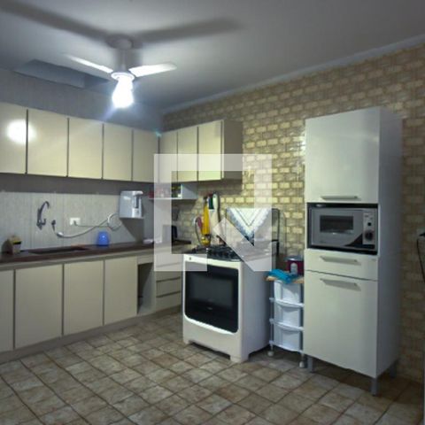 Casa à venda com 480m², 4 quartos e 2 vagas Casa à venda com 480m², 4 quartos e 2 vagasCozinha