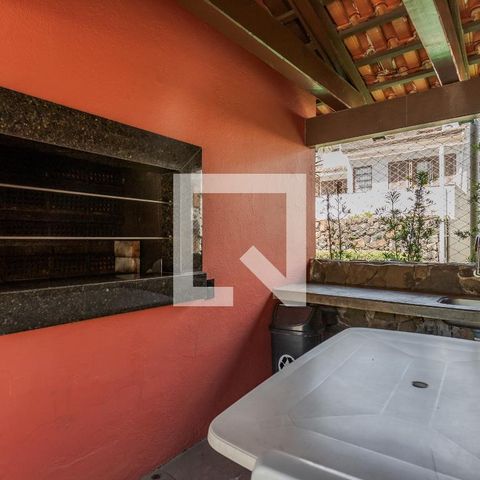 Casa de condomínio à venda com 220m², 4 quartos e 2 vagas Casa de condomínio à venda com 220m², 4 quartos e 2 vagasÁrea comum - Churrasqueira