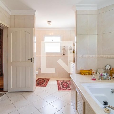 Casa de condomínio para alugar com 495m², 4 quartos e 4 vagas Casa de condomínio para alugar com 495m², 4 quartos e 4 vagasBanheiro do Quarto 4