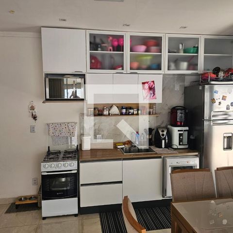 Casa à venda com 125m², 2 quartos e 2 vagas Casa à venda com 125m², 2 quartos e 2 vagasCozinha