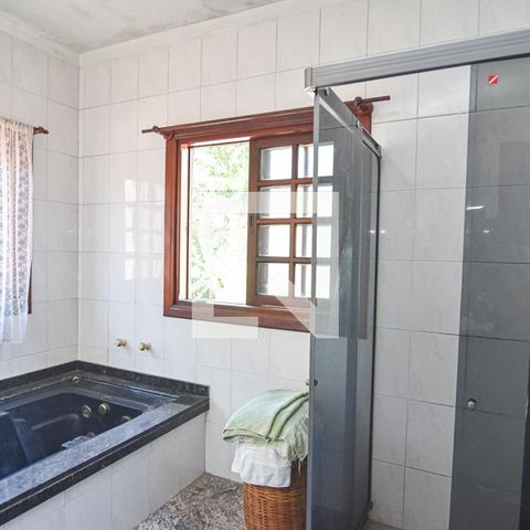 Casa à venda com 450m², 4 quartos e 3 vagasBanheiro da Suíte