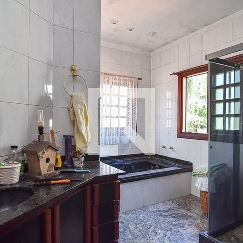 Casa à venda com 450m², 4 quartos e 3 vagasBanheiro da Suíte
